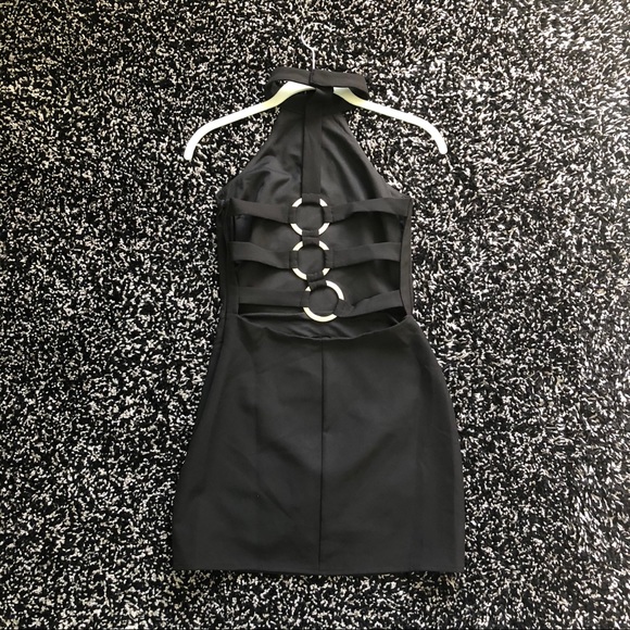 Bodycon black dress with open back - Picture 2 of 4